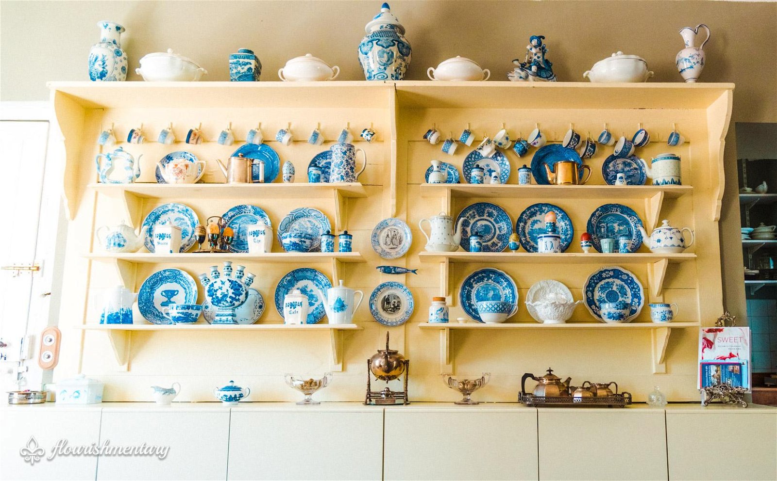 blue and white pottery Restored cabinets with English pottery from Stoke-on-Trent.