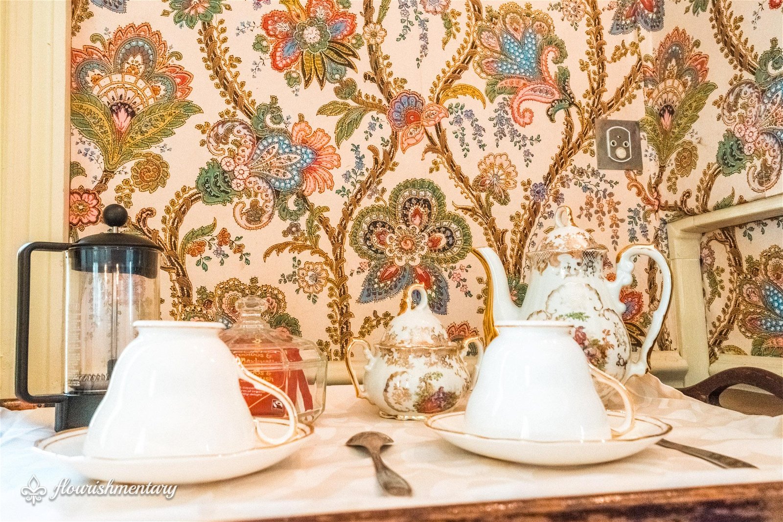 persian wallpaper and teacups chateau de lalande